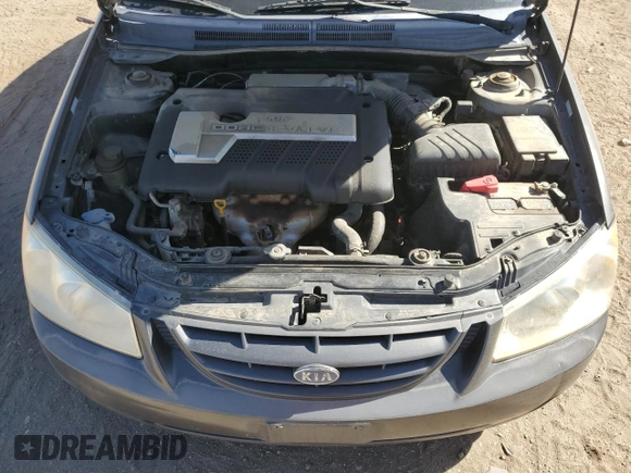 2006 Kia Spectra EX with VIN KNAFE122X65277053, listed as a Copart auction lot 75697314 with 147,156 mi miles and Salvage Title. Bid and sale history available at carsss.com. Image 12.