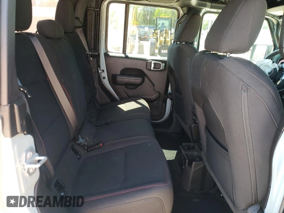 2023 Jeep Gladiator Rubicon с VIN 1C6JJTBG2PL542178, выставлен на аукционе Copart как лот 54684915 с пробегом 24 687 миль миль и Списание • Salvage title. История ставок и продаж доступна на DreamBid. Изображение 10.