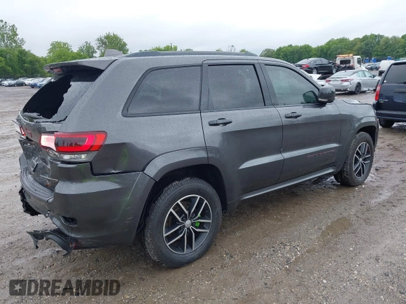 2017 Jeep Grand Cherokee Trailhawk with VIN 1C4RJFLG2HC645209, listed as a IAAI auction lot 42348470 with 170,905 mi miles and . Bid and sale history available at DreamBid. Image 4.