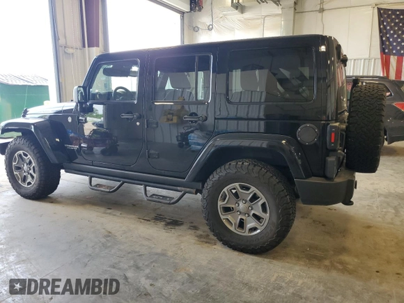 2013 Jeep Wrangler Unlimited Rubicon with VIN 1C4BJWFG0DL525304, listed as a Copart auction lot 59386085 with 130,043 mi miles and Clean title. Bid and sale history available at DreamBid. Image 2.