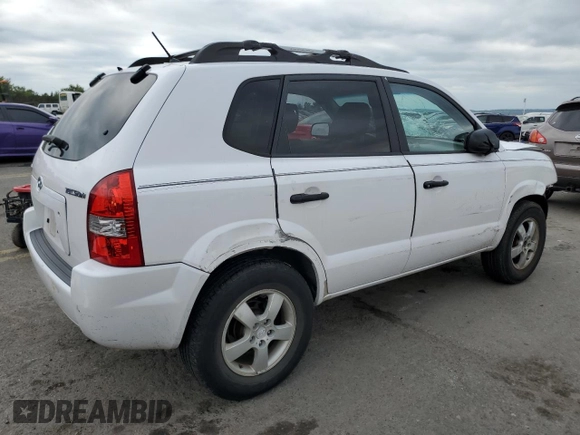2006 Hyundai Tucson GL with VIN KM8JM12B26U351969, listed as a Copart auction lot 69653074 with 126,722 mi miles and Salvage Title. Bid and sale history available at carsss.com. Image 3.