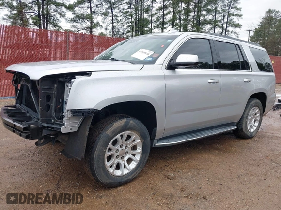 2015 GMC Yukon SLT with VIN 1GKS1BKC7FR628736, listed as a IAAI auction lot 41709926 with 130,254 mi miles. Bid and sale history available at carsss.com. Image 2.