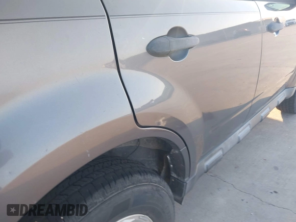 2011 Ford Escape XLT with VIN 1FMCU0D70BKA27369, listed as a IAAI auction lot 40970437 with 119,719 mi miles. Bid and sale history available at carsss.com. Image 14.