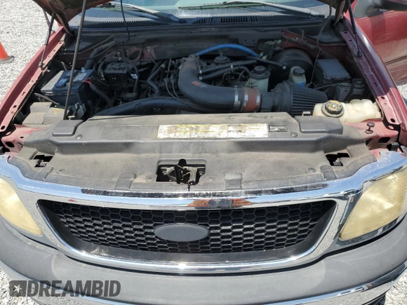 2001 Ford F-150 XLT с VIN 1FTRW07L01KF03457, выставлен на аукционе Copart как лот 60086725 с пробегом 205 917 миль миль и Списание • Salvage title. История ставок и продаж доступна на DreamBid. Изображение 11.