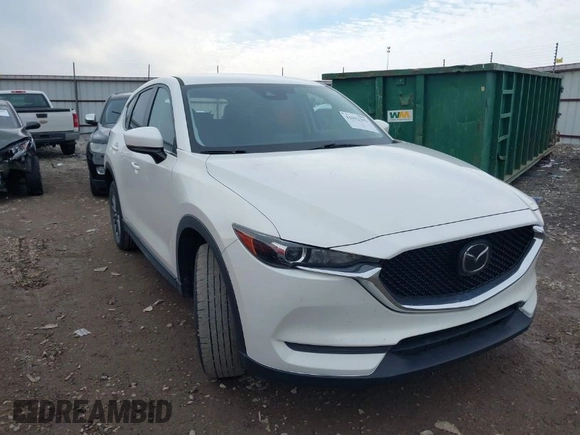 2020 Mazda CX-5 Touring with VIN JM3KFBCM6L0764982, listed as a IAAI auction lot 41632293 with 96,042 mi miles. Bid and sale history available at carsss.com. Image 1.