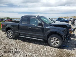 2018 Ford F-150 XL with VIN 1FTEX1EP1JKF38242, listed as a Copart auction lot 53517715 with 134,371 mi miles and Salvage title. Bid and sale history available at DreamBid. Image 4.