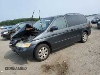 2003 Honda Odyssey EX-L z VIN 5FNRL18923B130343, wystawiony jako Copart lot #59278055 z przebiegiem Nie podano mil oraz Czysty tytuł • Clean title. Historia ofert i sprzedaży dostępna na DreamBid. Obrazek 1.