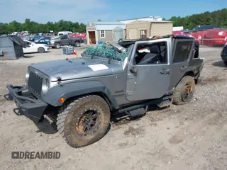 2017 Jeep Wrangler Unlimited Sport with VIN 1C4HJWDG6HL592265, listed as a IAAI auction lot 42335663 with 89,314 mi miles and . Bid and sale history available at DreamBid. Image 2.