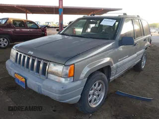 1998 Jeep Grand Cherokee Laredo with VIN 1J4GZ58S9WC136684, listed as a IAAI auction lot 41444103 with 1 mi miles. Bid and sale history available at carsss.com. Image 16.