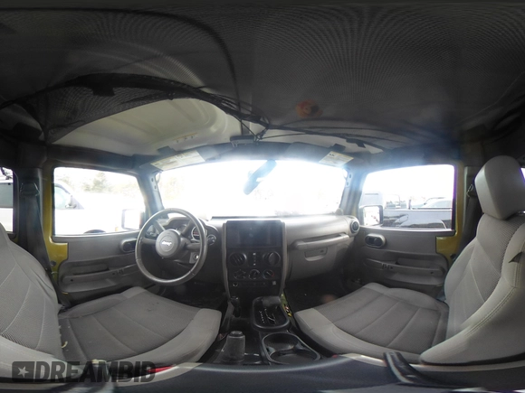 2007 Jeep Wrangler Unlimited Sahara z VIN 1J4GA59137L147257, wystawiony jako IAAI lot #41565673 z przebiegiem 187 982 mil mil oraz . Historia ofert i sprzedaży dostępna na DreamBid. Obrazek 20.