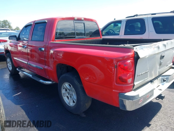 2007 Dodge Dakota SLT with VIN 1D7HE48K37S107954, listed as a IAAI auction lot 42191935 with 223,090 mi miles and . Bid and sale history available at carsss.com. Image 3.