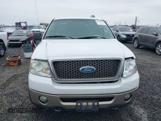 2006 Ford F-150 XLT with VIN 1FTPX14596NA27117, listed as a IAAI auction lot 41589818 with 166,727 mi miles. Bid and sale history available at carsss.com. Image 12.