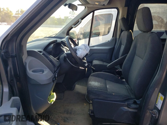 2015 Ford Transit with VIN 1FTNE1CM9FKA51425, listed as a Copart auction lot 70039184 with 146,782 mi miles and Salvage Title. Bid and sale history available at DreamBid. Image 7.