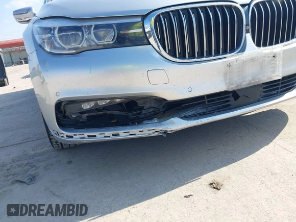 2016 BMW 7 Series 740i with VIN WBA7E2C5XGG739099, listed as a IAAI auction lot 41526038 with 123,900 mi miles. Bid and sale history available at carsss.com. Image 17.