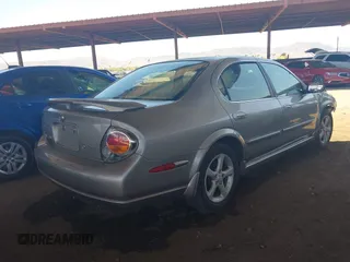 2003 Nissan Maxima SE z VIN JN1DA31D43T512898, wystawiony jako IAAI lot #42111179 z przebiegiem 210 817 mil mil oraz . Historia ofert i sprzedaży dostępna na DreamBid. Obrazek 4.