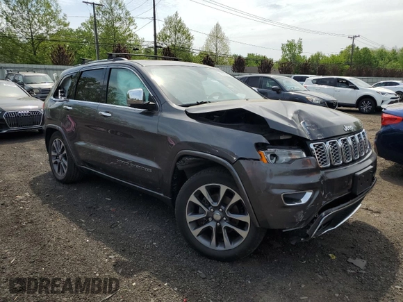 2017 Jeep Grand Cherokee Overland z VIN 1C4RJFCG2HC913434, wystawiony jako Copart lot #56580955 z przebiegiem 86 358 mil mil oraz Szkoda całkowita • Salvage title. Historia ofert i sprzedaży dostępna na DreamBid. Obrazek 4.