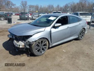 2021 Honda Civic Sport with VIN 2HGFC2F83MH540939, listed as a IAAI auction lot 41789508 with 100,274 mi miles and . Bid and sale history available at DreamBid. Image 18.