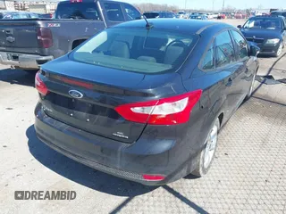 2014 Ford Focus SE with VIN 1FADP3F22EL207587, listed as a IAAI auction lot 41818555 with 119,811 mi miles. Bid and sale history available at carsss.com. Image 4.