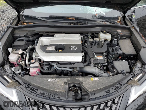 2021 Lexus UX 250h with VIN JTHP9JBH4M2052480, listed as a Copart auction lot 59948845 with 22,033 mi miles and Salvage title. Bid and sale history available at DreamBid. Image 12.