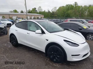 2024 Tesla Model Y Long Range with VIN 7SAYGAEE2RF014315, listed as a IAAI auction lot 42053183 with 36,521 mi miles and . Bid and sale history available at carsss.com. Image 1.