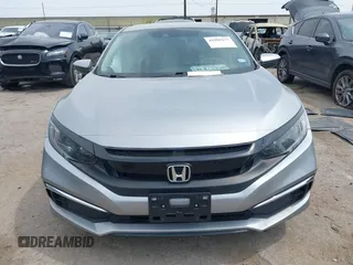 2019 Honda Civic LX with VIN 19XFC2F66KE026931, listed as a IAAI auction lot 41885137 with 55,057 mi miles and . Bid and sale history available at DreamBid. Image 12.