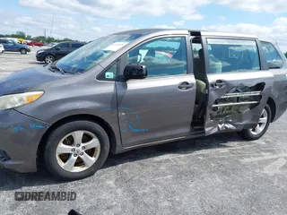 2012 Toyota Sienna with VIN 5TDZK3DC8CS190719, listed as a IAAI auction lot 41983695 with 68,377 mi miles and . Bid and sale history available at DreamBid. Image 6.