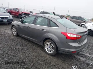 2012 Ford Focus SEL with VIN 1FAHP3H26CL239437, listed as a IAAI auction lot 41164604 with 169,946 mi miles. Bid and sale history available at carsss.com. Image 3.