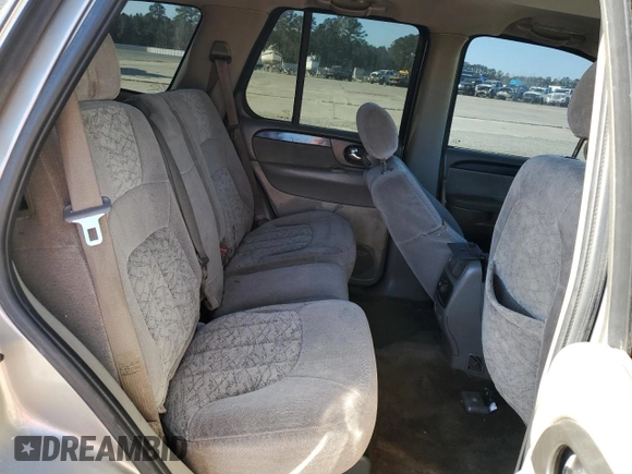 2003 GMC Envoy SLT z VIN 1GKDS13S832228632, wystawiony jako Copart lot #50330805 z przebiegiem 224 605 mil mil oraz Szkoda całkowita • Salvage title. Historia ofert i sprzedaży dostępna na DreamBid. Obrazek 11.