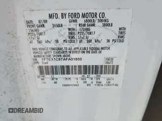 2010 Ford F-150 XL with VIN 1FTEX1C87AFA01850, listed as a Copart auction lot 63544455 with 107,615 mi miles and Salvage title. Bid and sale history available at DreamBid. Image 12.