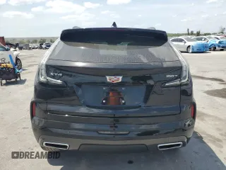 2024 Cadillac XT4 FWD Sport with VIN 1GYFZER41RF136970, listed as a Copart auction lot 53550865 with 13,143 mi miles and Non repairable. Bid and sale history available at DreamBid. Image 6.