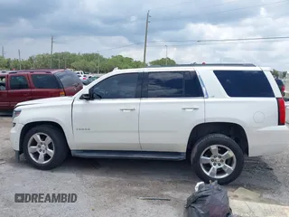 2015 Chevrolet Tahoe LT with VIN 1GNSCBKC0FR739951, listed as a IAAI auction lot 42332982 with 133,046 mi miles and . Bid and sale history available at DreamBid. Image 14.