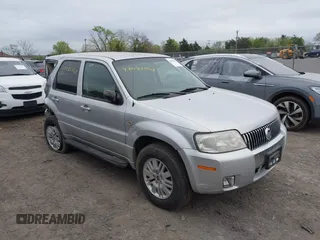 2005 Mercury Mariner Convenience z VIN 4M2YU57Z55DJ18600, wystawiony jako IAAI lot #42082068 z przebiegiem 141 530 mil mil oraz . Historia ofert i sprzedaży dostępna na DreamBid. Obrazek 1.
