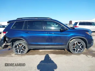 2023 Honda Passport Elite with VIN 5FNYF8H06PB012234, listed as a IAAI auction lot 41208146 with 38,491 mi miles and . Bid and sale history available at DreamBid. Image 13.