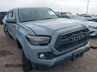 2021 Toyota Tacoma SR with VIN 5TFAX5GN3MX193319, listed as a IAAI auction lot 42289361 with 81,339 mi miles and . Bid and sale history available at DreamBid. Image 1.