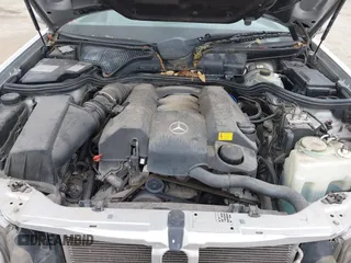 1999 Mercedes-Benz E-Class with VIN WDBJH65F5XA721205, listed as a IAAI auction lot 42068204 with 183,421 mi miles. Bid and sale history available at carsss.com. Image 10.