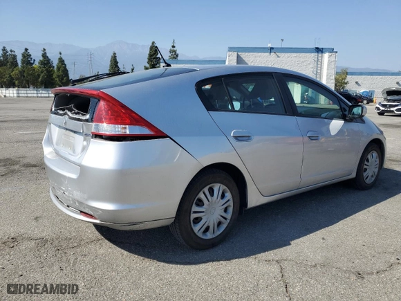 2010 Honda Insight LX with VIN JHMZE2H53AS008294, listed as a Copart auction lot 52011825 with 126,673 mi miles and Salvage Title. Bid and sale history available at carsss.com. Image 3.