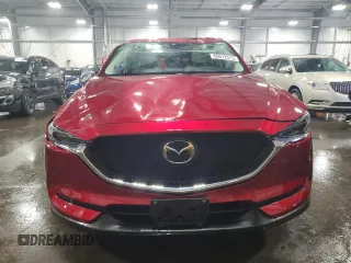 2018 Mazda CX-5 Grand Touring with VIN JM3KFBDM5J0454026, listed as a Copart auction lot 60672315 with 12,292 mi miles and Salvage title. Bid and sale history available at DreamBid. Image 5.