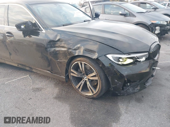 2021 BMW 3 Series 330i with VIN 3MW5R1J02M8B95303, listed as a IAAI auction lot 42184843 with 55,928 mi miles and . Bid and sale history available at carsss.com. Image 6.