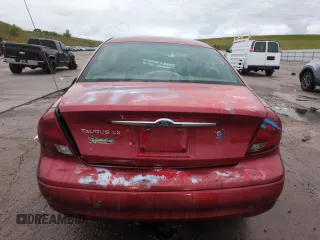 2001 Ford Taurus LX with VIN 1FAFP52UX1A176008, listed as a Copart auction lot 58983935 with 123,985 mi miles and Salvage title. Bid and sale history available at DreamBid. Image 6.