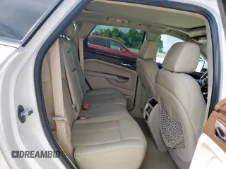 2014 Cadillac SRX Performance Collection with VIN 3GYFNCE39ES687733, listed as a Copart auction lot 62770665 with 151,714 mi miles and Salvage title. Bid and sale history available at DreamBid. Image 11.