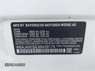 2018 BMW 5 Series 530i with VIN WBAJA5C5XJWA39179, listed as a IAAI auction lot 42380945 with 76,410 mi miles and . Bid and sale history available at DreamBid. Image 9.