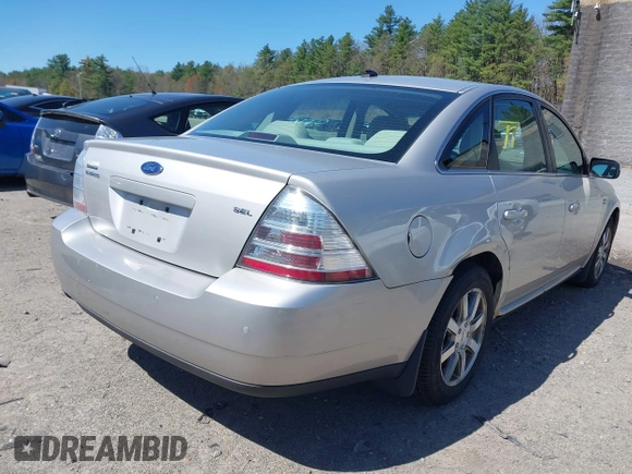 2008 Ford Taurus SEL with VIN 1FAHP24W18G115823, listed as a IAAI auction lot 42119435 with 57,867 mi miles. Bid and sale history available at carsss.com. Image 4.