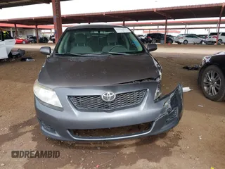 2010 Toyota Corolla z VIN JTDBU4EE7AJ071149, wystawiony jako IAAI lot #41818917 z przebiegiem 105 923 mil mil oraz . Historia ofert i sprzedaży dostępna na DreamBid. Obrazek 12.