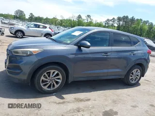 2016 Hyundai Tucson SE z VIN KM8J23A44GU119203, wystawiony jako IAAI lot #42104002 z przebiegiem 139 797 mil mil oraz . Historia ofert i sprzedaży dostępna na DreamBid. Obrazek 14.