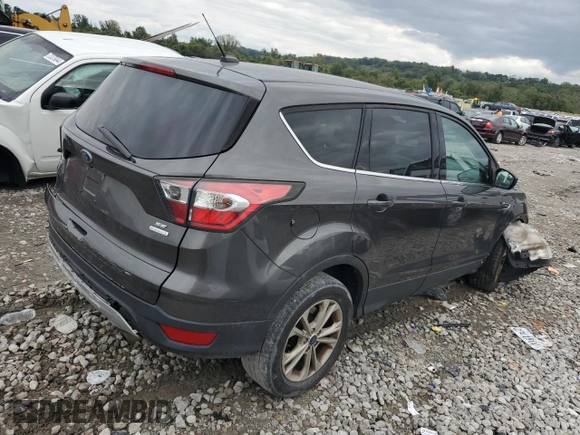 2017 Ford Escape SE with VIN 1FMCU0GD7HUB28357, listed as a Copart auction lot 73229554 with 121,912 mi miles and Salvage Title. Bid and sale history available at carsss.com. Image 4.