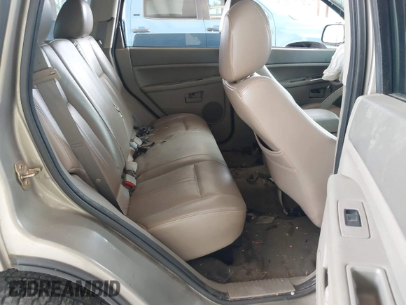 2005 Jeep Grand Cherokee Laredo with VIN 1J4GR48KX5C589625, listed as a IAAI auction lot 42699102 with Not provided miles and . Bid and sale history available at DreamBid. Image 8.