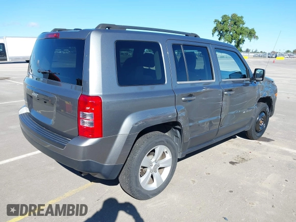 2014 Jeep Patriot Sport with VIN 1C4NJRBB5ED574390, listed as a IAAI auction lot 41949395 with 61,911 mi miles. Bid and sale history available at carsss.com. Image 4.