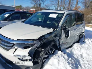 2017 Honda Pilot Touring with VIN 5FNYF6H98HB102313, listed as a IAAI auction lot 41244311 with 106,931 mi miles. Bid and sale history available at carsss.com. Image 6.