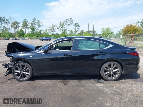 2021 Lexus ES with VIN 58AGZ1B10MU086770, listed as a IAAI auction lot 42022988 with 57,958 mi miles. Bid and sale history available at carsss.com. Image 14.