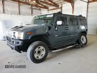 2005 Hummer H2 SUV z VIN 5GRGN23U65H127711, wystawiony jako Copart lot #53180865 z przebiegiem 178 085 mil mil oraz Szkody całkowita. Historia ofert i sprzedaży dostępna na DreamBid. Obrazek 1.